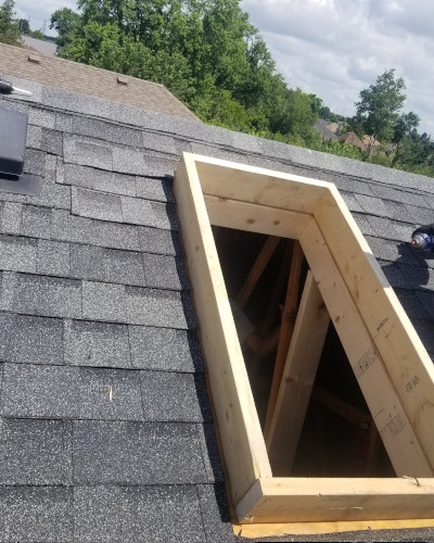 An image of a roof with place for skylight.